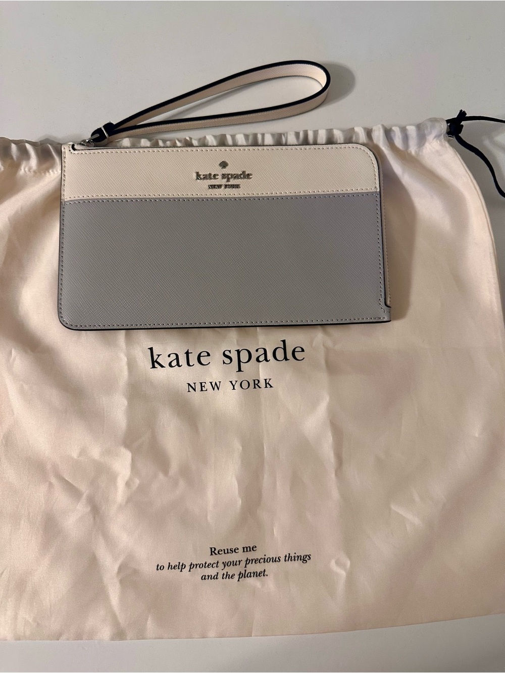 kate spade Two-Tone White and Light Gray Saffiano Wristlet